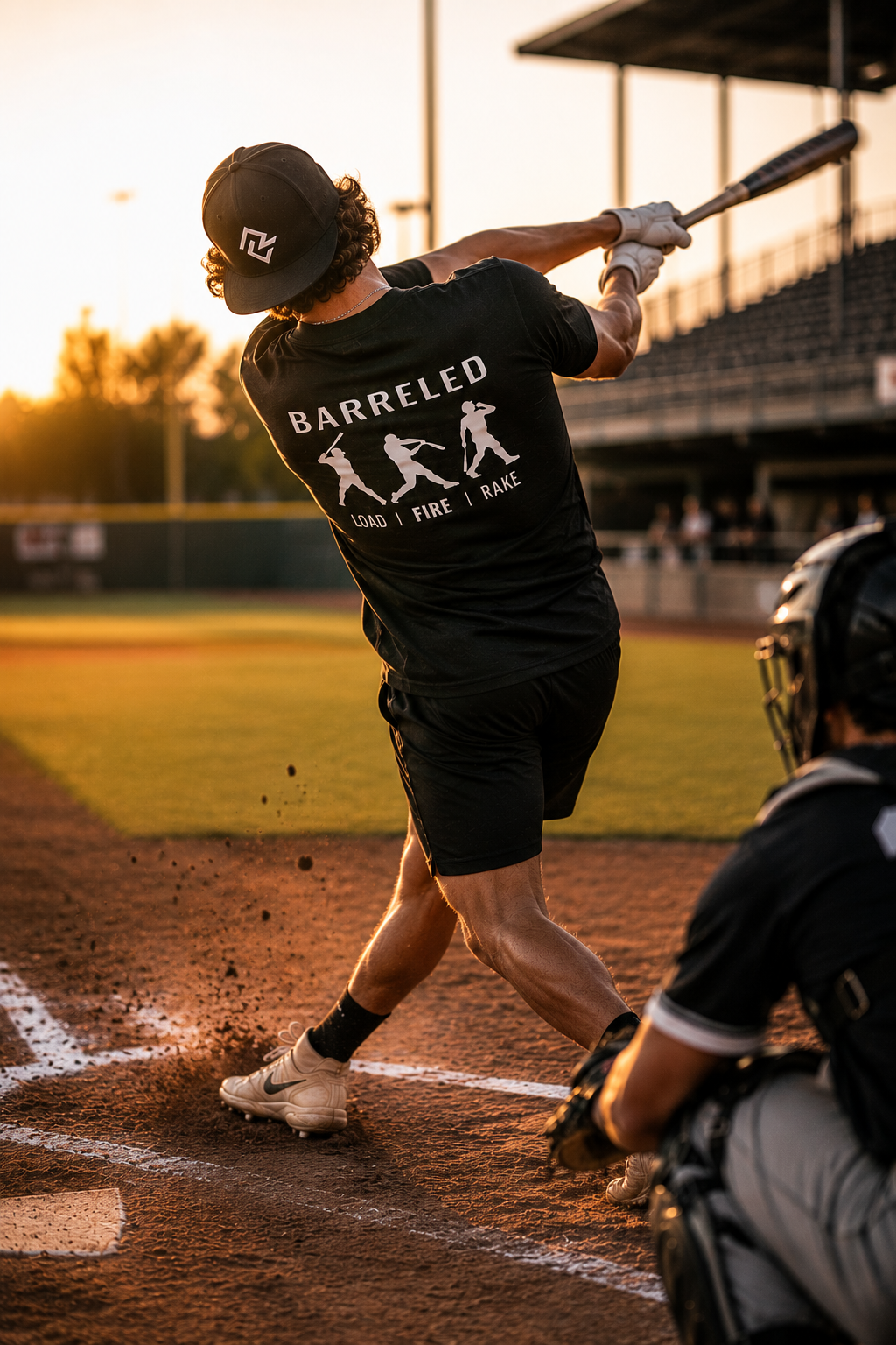 Action shot of model wearing the BARRELED premium baseball t-shirt and RC logo snapback.