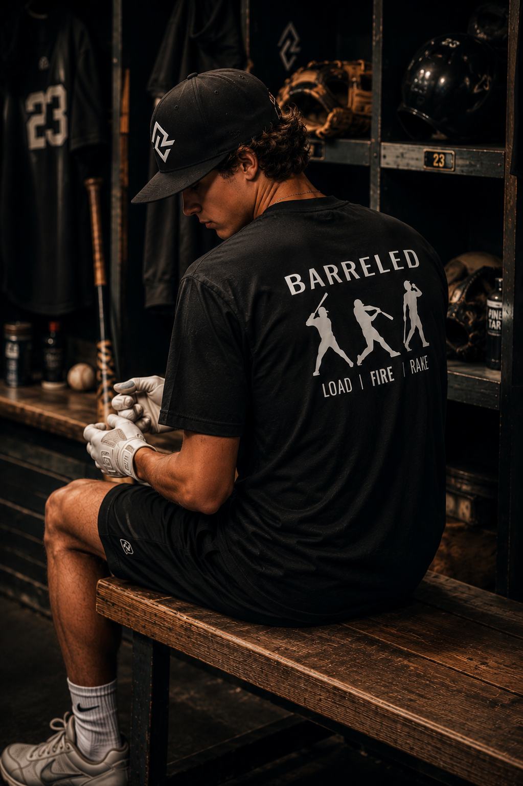 Model wearing the BARRELED premium baseball t-shirt and RC snapback by Rake City.