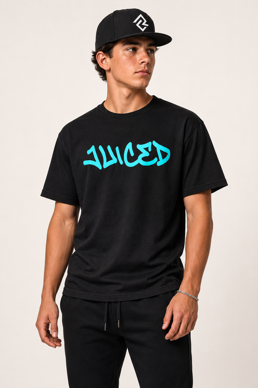 Model wearing the JUICED premium baseball t-shirt and RC snapback by Rake City.