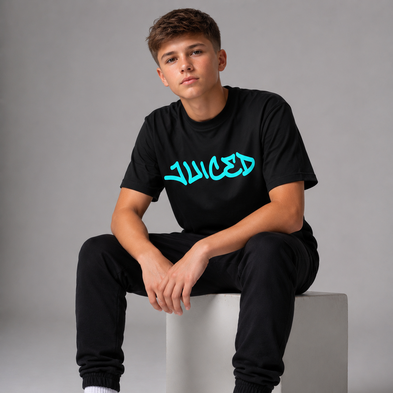 Model wearing the black JUICED premium t-shirt by Rake City.