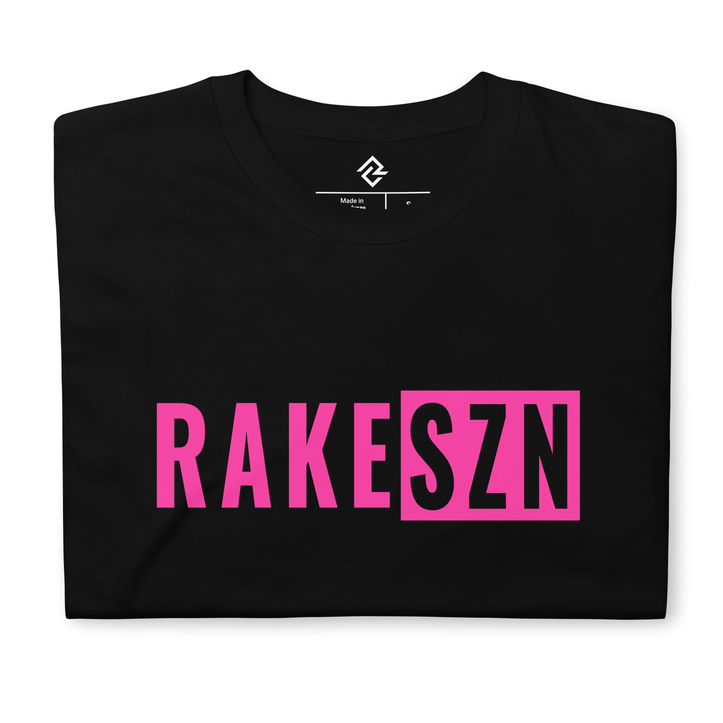Top down folded view of the youth pink RAKESZN premium baseball t-shirt by Rake City.